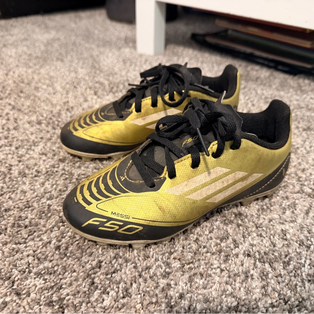Adidas F50 Club FxG J Messi Gold/Black Youth Soccer Cleats - Picture 2 of 5